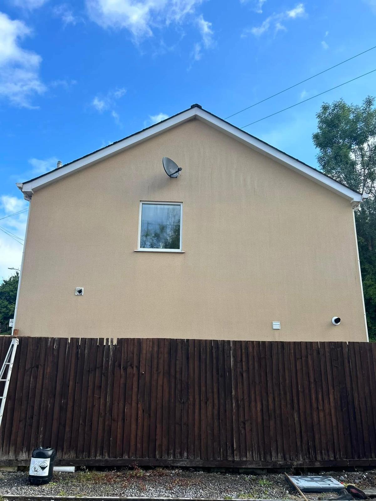 Rendered property after JPE softwashing — algae removed, render restored across South Wales